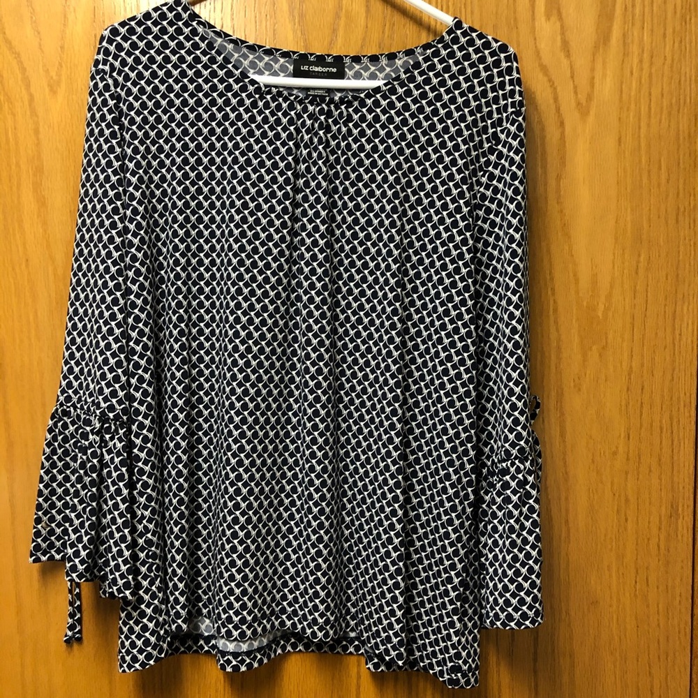 Loose fitting dressy blouse.  Color is navy.